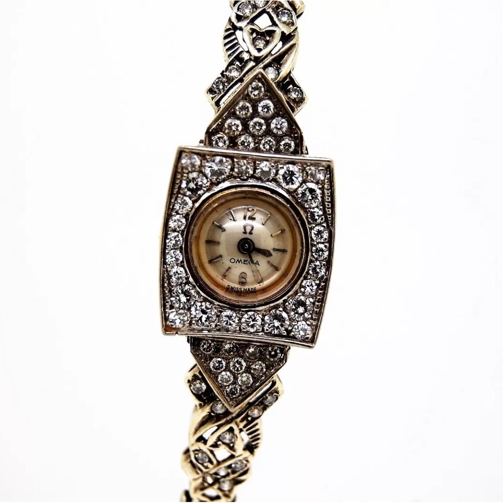 Ladies 18k gold Omega back winder diamond watch